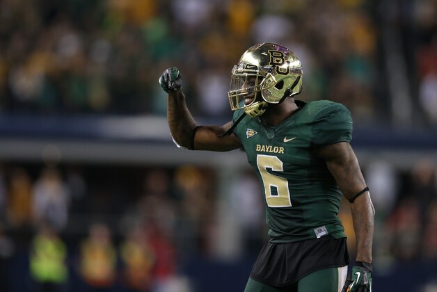 Nov 16, 2013; Arlington, TX, USA; Baylor Bears safety Ahmad Dixon (6) reacts to the sidelines during the game against the Texas Tech Red Raiders at AT&T Stadium. Mandatory Credit: Matthew Emmons-USA TODAY Sports