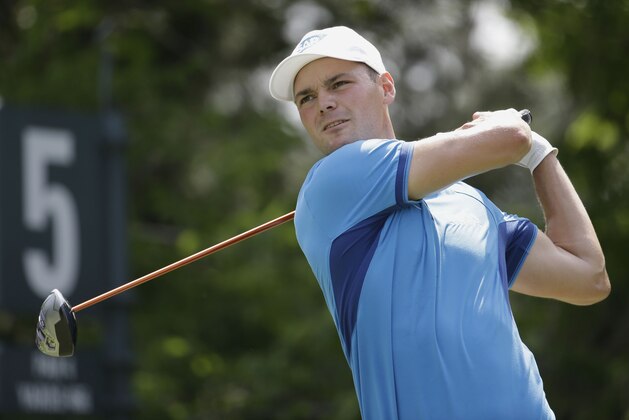Martin Kaymer, of Germany, hits from the fifth tee during the third round of The Players championship golf tournament at TPC Sawgrass, Saturday, May 10, 2014, in Ponte Vedra Beach, Fla. (AP Photo/Lynne Sladky)