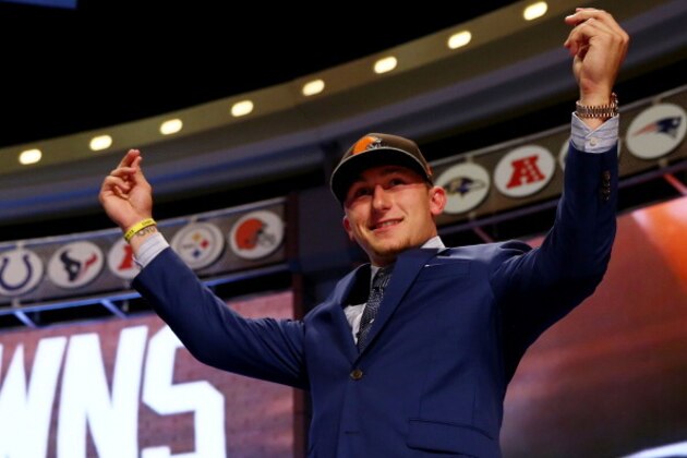 NEW YORK, NY - MAY 08:  Johnny Manziel of the Texas A&M Aggies takes the stage after he was picked #22 overall by the Cleveland Browns during the first round of the 2014 NFL Draft at Radio City Music Hall on May 8, 2014 in New York City.  (Photo by Elsa/Getty Images)