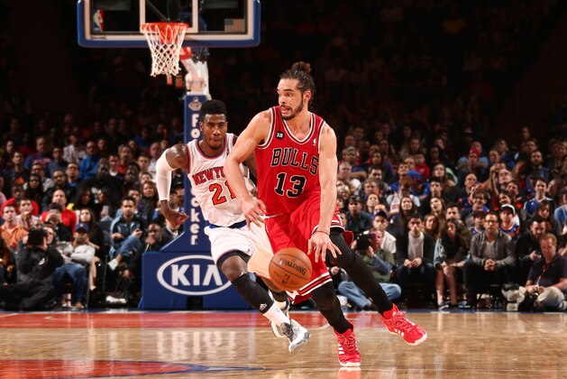 NEW YORK, NY - APRIL 13: Joakim Noah #13 of the Chicago Bulls handles the ball against the New York Knicks during a game at Madison Square Garden in New York City on April 13, 2014.  NOTE TO USER: User expressly acknowledges and agrees that, by downloading and or using this photograph, User is consenting to the terms and conditions of the Getty Images License Agreement. Mandatory Copyright Notice: Copyright 2014 NBAE  (Photo by Nathaniel S. Butler/NBAE via Getty Images)