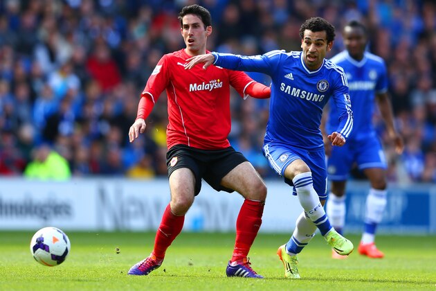 CARDIFF, WALES - MAY 11:  Peter Whittingham of Cardiff City and Mohamed Salah of Chelsea compete for the ball during the Barclays Premier League match between Cardiff City and Chelsea at Cardiff City Stadium on May 11, 2014 in Cardiff, Wales.  (Photo by Michael Steele/Getty Images)