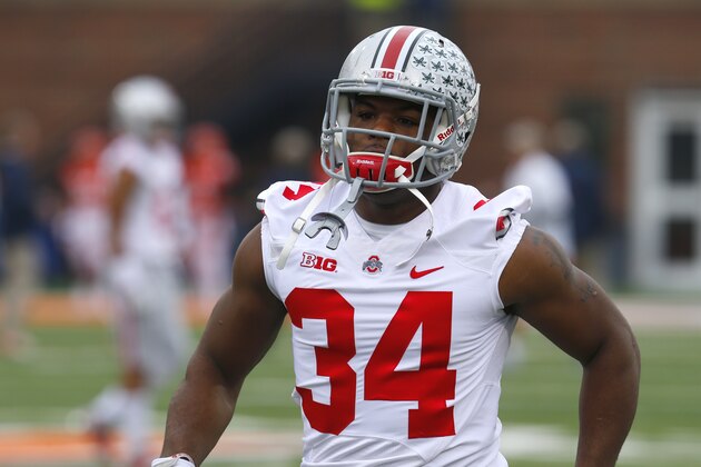 Ohio State running back Carlos Hyde (34) warms-up before an NCAA college football game against Illinois on Saturday, Nov. 16, 2013, in Champaign, Ill. (AP Photo/Jeff Haynes)