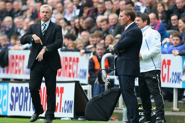 NEWCASTLE UPON TYNE, ENGLAND - OCTOBER 19:  Manager Alan Pardew of Newcastle United and Manager Brendan Rodgers of Liverpool give instructions from the touchline during the Barclays Premier League match between Newcastle United and Liverpool at St James' Park on October 19, 2013 in Newcastle upon Tyne, England.  (Photo by Julian Finney/Getty Images)