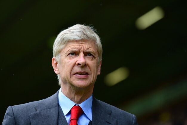 NORWICH, ENGLAND - MAY 11:  Arsene Wenger manager of Arsenal looks on during the Barclays Premier League match between Norwich City and Arsenal at Carrow Road on May 11, 2014 in Norwich, England.  (Photo by Jamie McDonald/Getty Images)