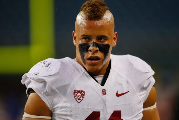 SEATTLE, WA - SEPTEMBER 28:  Linebacker Shayne Skov #11 of the Stanford Cardinal warms up prior to the game against the Washington State Cougars on September 28, 2013 at CenturyLink Field in Seattle, Washington.  (Photo by Otto Greule Jr/Getty Images)