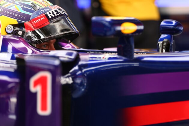 MONTMELO, SPAIN - MAY 11:  Sebastian Vettel of Germany and Infiniti Red Bull Racing sits in his car in the garage during the Spanish Formula One Grand Prix at Circuit de Catalunya on May 11, 2014 in Montmelo, Spain.  (Photo by Mark Thompson/Getty Images)