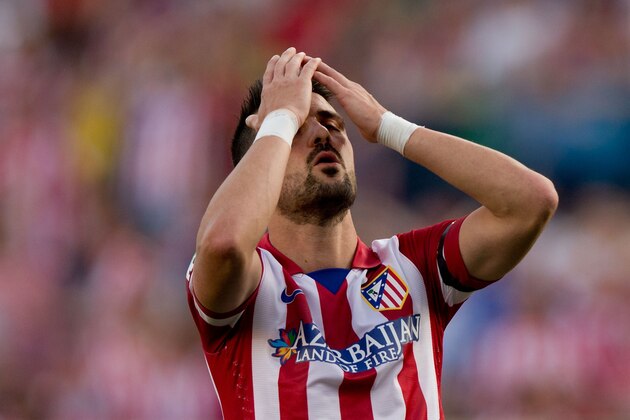 MADRID, SPAIN - MAY 11:  David Villa of Atletico de Madrid reacts as he fail to score during the La Liga match between Club Atletico de Madrid and Malaga CF at Vicente Calderon Stadium on May 11, 2014 in Madrid, Spain.  (Photo by Gonzalo Arroyo Moreno/Getty Images)