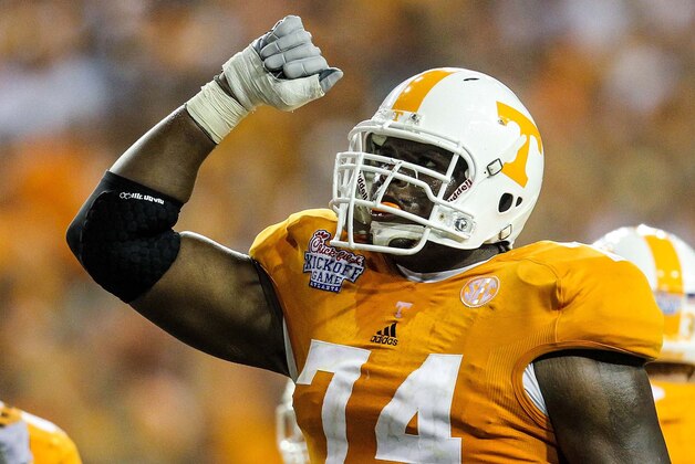August 31, 2012; Atlanta, GA, USA; Tennessee Volunteers offensive linesman Antonio Richardson (74) celebrates in the second half against the North Carolina State Wolfpack at the Georgia Dome. Tennessee beat NC State 35-21. Mandatory Credit: Daniel Shirey-USA TODAY Sports