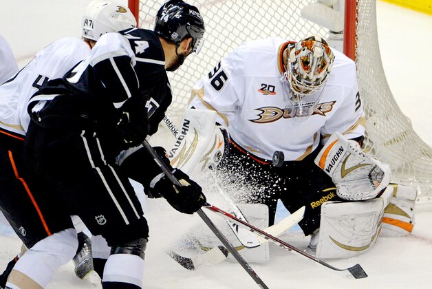 May 10, 2014; Los Angeles, CA, USA; Anaheim Ducks goalie John Gibson (36) defends the goal against Los Angeles Kings left wing Dwight King (74) in game four of the second round of the 2014 Stanley Cup Playoffs at Staples Center. Mandatory Credit: Kirby Lee-USA TODAY Sports
