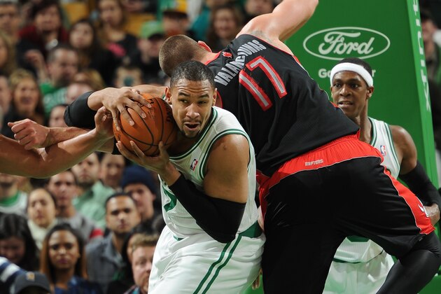 BOSTON, MA - MARCH 26: Jared Sullinger #7 of the Boston Celtics holds the ball against the Toronto Raptors on March 26, 2014 at the TD Garden in Boston, Massachusetts.  NOTE TO USER: User expressly acknowledges and agrees that, by downloading and or using this photograph, User is consenting to the terms and conditions of the Getty Images License Agreement. Mandatory Copyright Notice: Copyright 2014 NBAE  (Photo by Brian Babineau/NBAE via Getty Images)