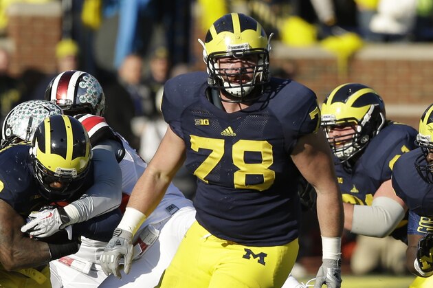 Michigan offensive linesman Erik Magnuson (78) is seen during the second quarter of an NCAA college football game against Ohio State in Ann Arbor, Mich., Saturday, Nov. 30, 2013. (AP Photo/Carlos Osorio)