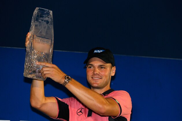 PONTE VEDRA BEACH, FL - MAY 11:  Martin Kaymer of Germany celebrates with the winner's trophy after his one-stroke victory at THE PLAYERS Championship on The Stadium Course at TPC Sawgrass on May 11, 2014 in Ponte Vedra Beach, Florida.  (Photo by Kevin C. Cox/Getty Images)