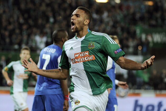 FILE - In this Nov. 7, 2013, file photo, Rapid Vienna's Terrence Boyd celebrates after scoring during the Europa League group G soccer match against Belgian club  KRC Genk, in Vienna, Austria. While fans of the U.S. national team wait to see if Jozy Altidore can find his missing scoring touch for Sunderland in the final weeks of the Premier League, coach Jurgen Klinsmann has noticed another American striker heating up in Austria. Boyd scored two more goals last weekend for Rapid Vienna, netting both in a 2-1 win over league champion Red Bull Salzburg. That followed his two-goal performance a week earlier. (AP Photo/Hans Punz, File)