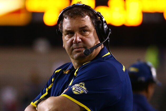 Dec 28, 2013; Tempe, AZ, USA; Michigan Wolverines head coach Brady Hoke in the second half against the Kansas State Wildcats during the Buffalo Wild Wings Bowl at Sun Devil Stadium. Kansas State defeated Michigan 31-14. Mandatory Credit: Mark J. Rebilas-USA TODAY Sports