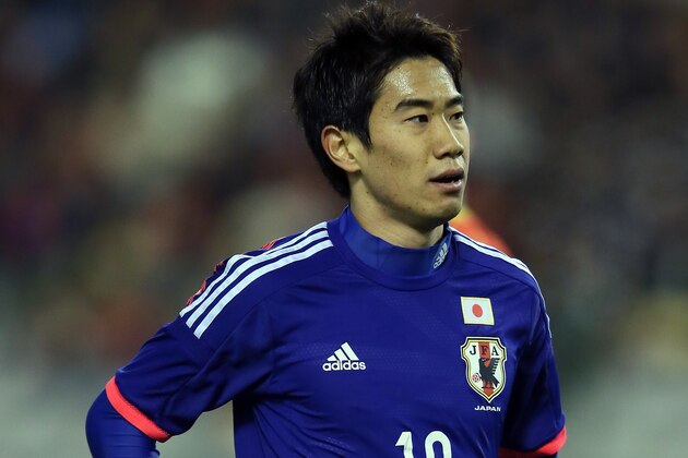BRUSSELS, BELGIUM - NOVEMBER 19: Shinji Kagawa of Japan looks on during the international friendly match between Belgium and Japan at King Badouin stadium on November 19, 2013 in Brussels, Belgium.  (Photo by Christof Koepsel/Getty Images)