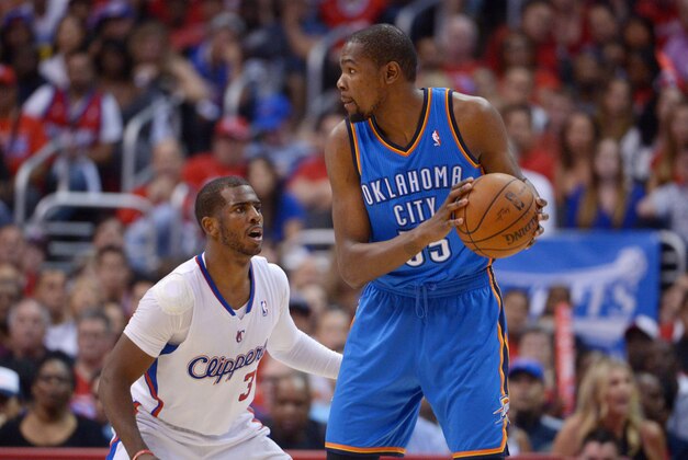 May 11, 2014; Los Angeles, CA, USA; Oklahoma City Thunder forward Kevin Durant (35) is defended by Los Angeles Clippers guard Chris Paul (3) in game four of the second round of the 2014 NBA Playoffs at Staples Center. The Clippers defeated the Thunder 101-99 to tie the series 2-2.Mandatory Credit: Kirby Lee-USA TODAY Sports