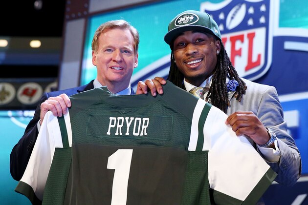 NEW YORK, NY - MAY 08:  Calvin Pryor of the Louisville Cardinals poses with NFL Commissioner Roger Goodell after he was picked #18 overall by the New York Jets during the first round of the 2014 NFL Draft at Radio City Music Hall on May 8, 2014 in New York City.  (Photo by Elsa/Getty Images)