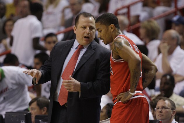 Chicago Bull's head coach Tom Thibodeau speaks to Derrick Rose during the first half against the Miami Heat of Game 3 of the NBA Eastern Conference finals basketball series in Miami, Sunday, May 22, 2011. (AP Photo/Lynne Sladky)
