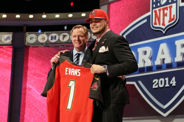 May 8, 2014; New York, NY, USA; Mike Evans (Texas A&M) poses with NFL commissioner Roger Goodell after being selected as the number seven overall pick in the first round of the 2014 NFL Draft to the Tampa Bay Buccaneers at Radio City Music Hall. Mandatory Credit: Adam Hunger-USA TODAY Sports