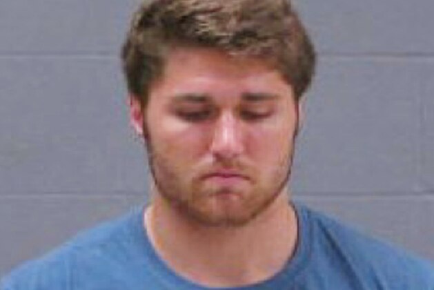 In this May 11, 2014 booking photo provided by Blue Earth County Jail, Philip Nelson, 20, is seen. The former Minnesota Gophers quarterback was arrested in Mankato, Minn., early Sunday, May 11, 2014, on suspicion of third-degree assault. Former Minnesota State, Mankato, linebacker Isaac Dallas Kolstad was in critical condition Monday after an alleged assault involving Nelson. (AP Photo/Blue Earth County Jail)