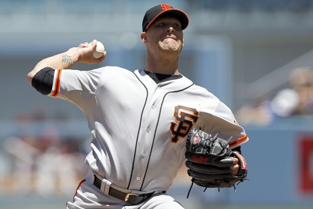 San Francisco Giants starting pitcher Tim Hudson throws against the Los Angeles Dodgers in the first inning of a baseball game on Sunday, May 11, 2014, in Los Angeles. (AP Photo/Alex Gallardo)