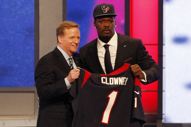 NEW YORK, NY - MAY 08:  Jadeveon Clowney of the South Carolina Gamecocks stands on stage with NFL Commissioner Roger Goodell after he was picked #1 overall by the Houston Texansduring the first round of the 2014 NFL Draft at Radio City Music Hall on May 8, 2014 in New York City.  (Photo by Cliff Hawkins/Getty Images)