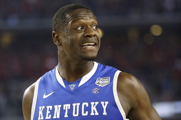Kentucky forward Julius Randle reacts during the first half of an NCAA Final Four tournament college basketball semifinal game against Wisconsin Saturday, April 5, 2014, in Arlington, Texas. (AP Photo/David J. Phillip)
