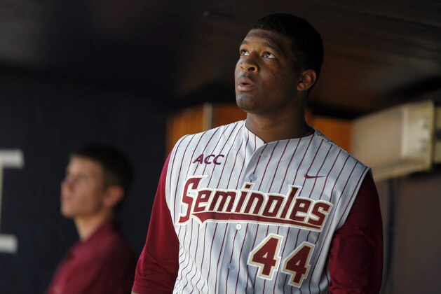 Feb 25, 2014; Tampa, FL, USA;  Florida State Seminoles pitcher/outfielder Jameis Winston (44) in the dugout during the sixth inning against the New York Yankees at George M. Steinbrenner Field. Mandatory Credit: Kim Klement-USA TODAY Sports