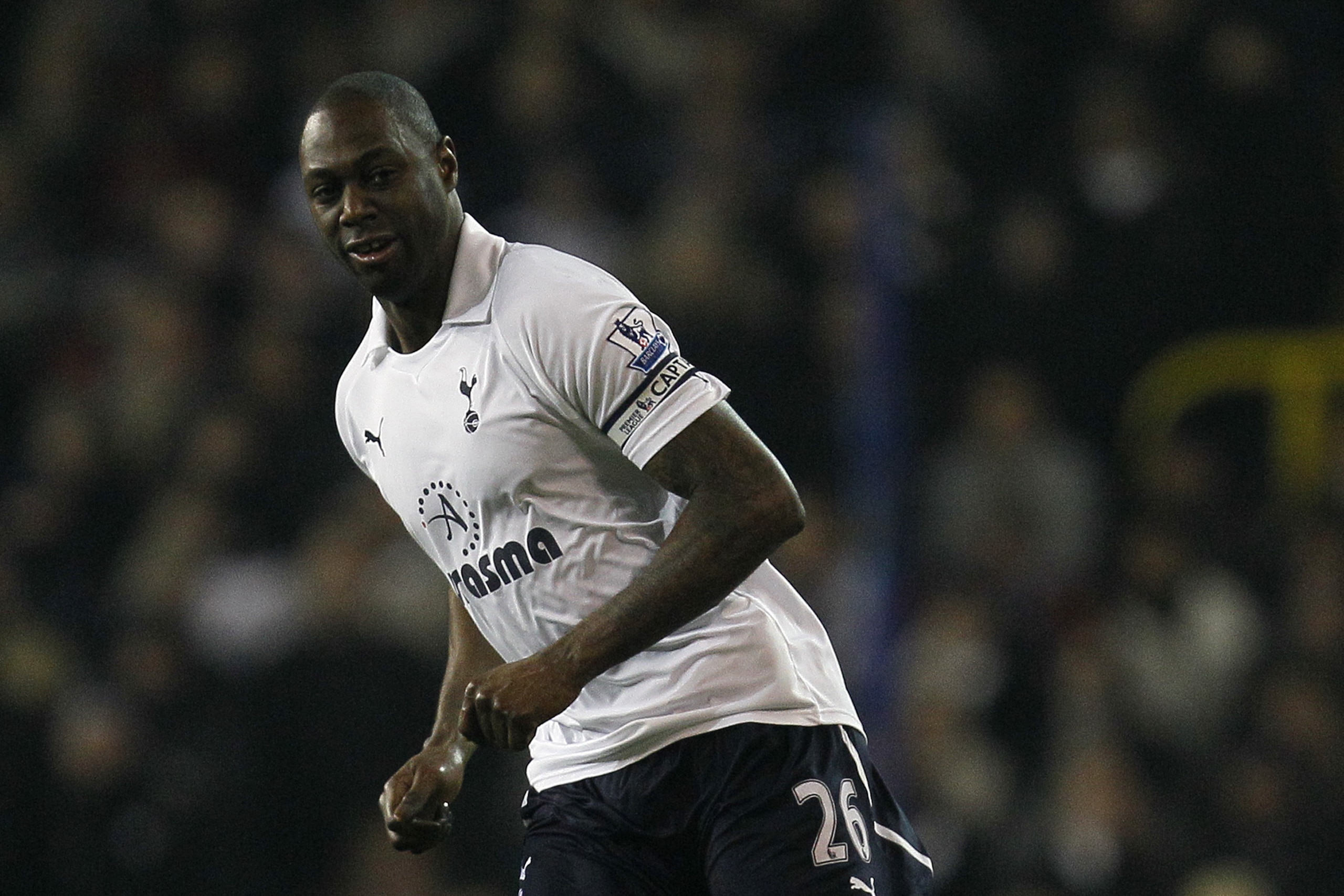 Tottenham Hotspur's Ledley King passes the ball as his side play Newcastle United during their English Premier League soccer match at Tottenham's White Hart Lane stadium in London, Saturday, Feb.   11, 2012. (AP Photo/Alastair Grant)
