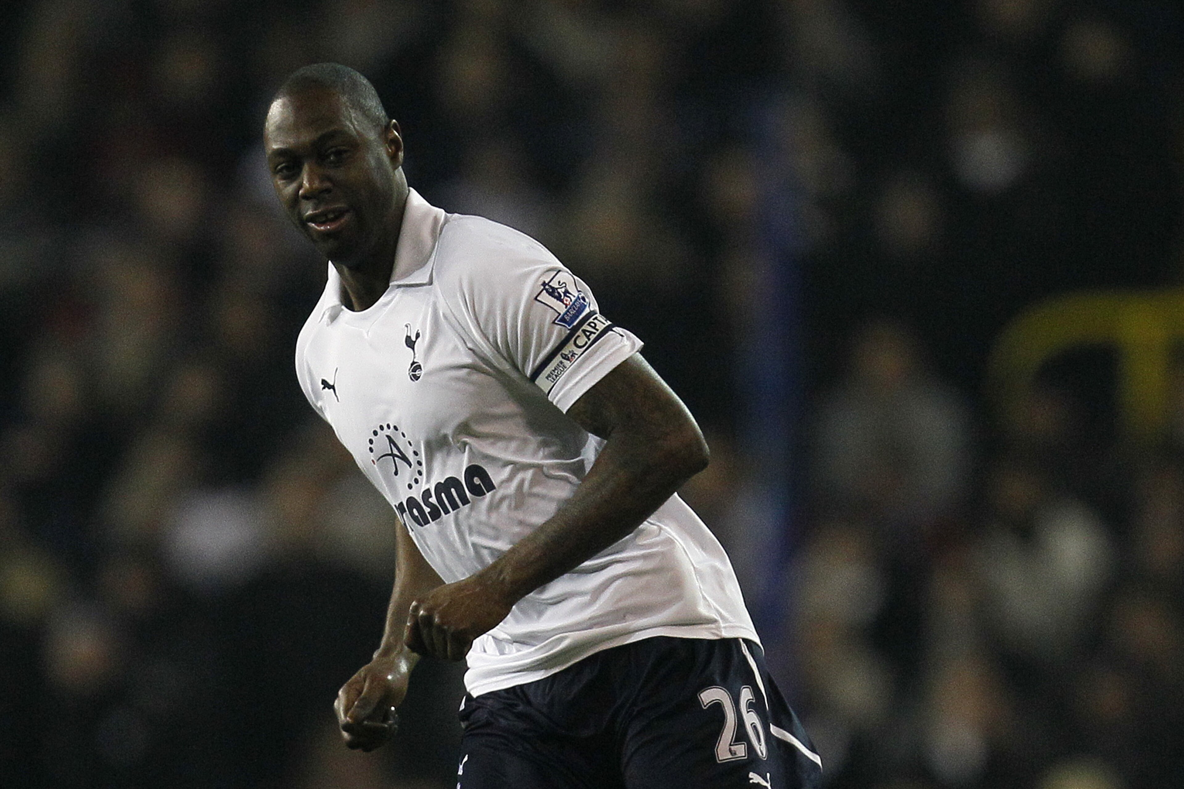 Tottenham Hotspur's Ledley King passes the ball as his side play Newcastle United during their English Premier League soccer match at Tottenham's White Hart Lane stadium in London, Saturday, Feb.   11, 2012. (AP Photo/Alastair Grant)