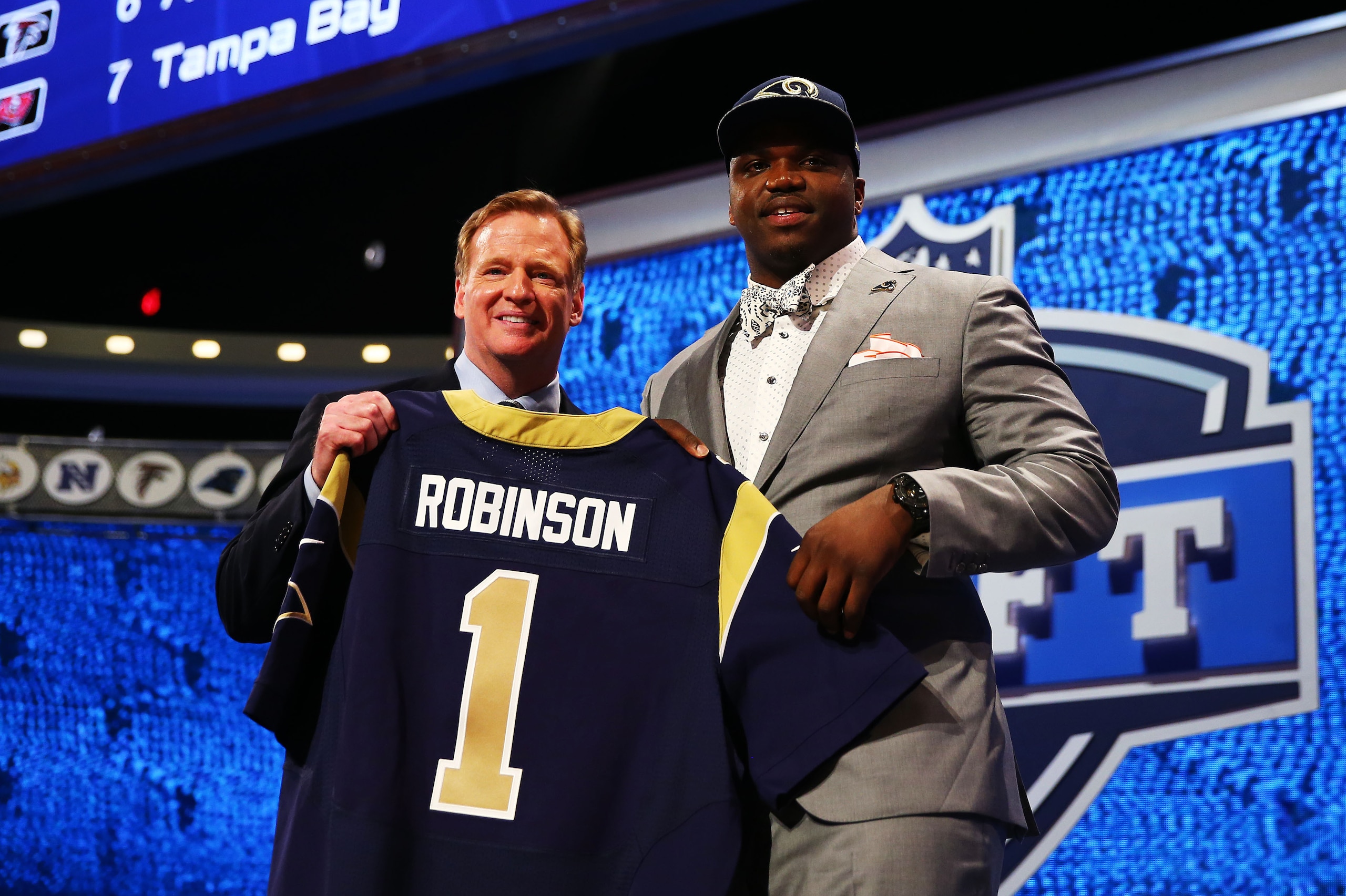 NEW YORK, NY - MAY 08:  Greg Robinson of the Auburn Tigers poses with NFL Commissioner Roger Goodell after he was picked #2 overall by the during the first round of the 2014 NFL Draft at Radio City Music Hall on May 8, 2014 in New York City.  (Photo by Elsa/Getty Images)