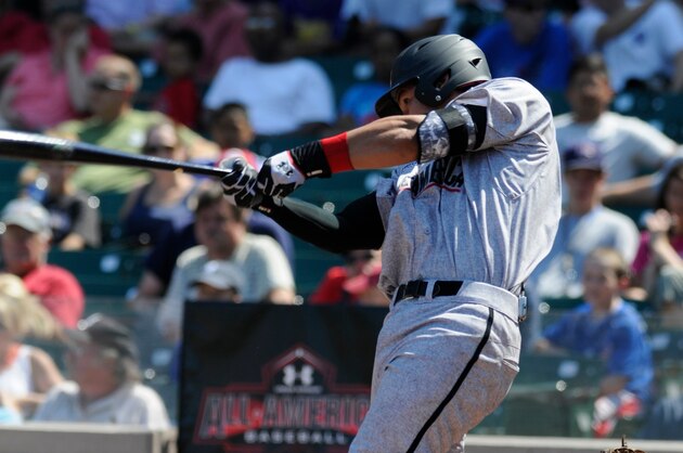 Aug 24, 2013; Chicago, IL, USA; American catcher Alex Jackson (10) connects with the ball during the 2013 Under Armour All-American Baseball game at Wrigley Field. Mandatory Credit: Reid Compton-USA TODAY Sports