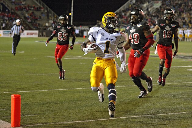 Kent State running back Dri Archer (1) crosses the goal line to score against Arkansas State in the second quarter of the GoDaddy.com Bowl NCAA college football game in Mobile, Ala., Sunday, Jan. 6, 2013. (AP Photo/G.M. Andrews)