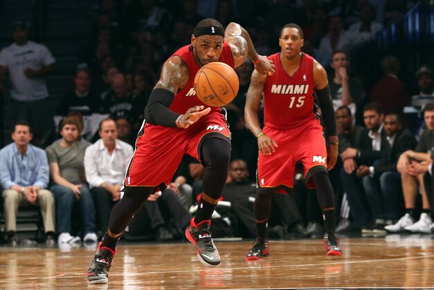 May 12, 2014; Brooklyn, NY, USA; Miami Heat forward LeBron James (6) chases a loose ball during the second quarter against the Brooklyn Nets in game four of the second round of the 2014 NBA Playoffs at Barclays Center. Mandatory Credit: Anthony Gruppuso-USA TODAY Sports