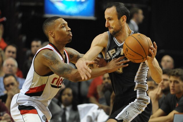 PORTLAND, OR - MAY 12:  Damian Lillard #0 of the Portland Trail Blazers reaches in on Manu Ginobili #20 of the San Antonio Spurs in the first quarter of Game Four of the Western Conference Semifinals during the 2014 NBA Playoffs at the Moda Center on May 12, 2014 in Portland, Oregon. NOTE TO USER: User expressly acknowledges and agrees that, by downloading and or using this photograph, User is consenting to the terms and conditions of the Getty Images License Agreement. (Photo by Steve Dykes/Getty Images)