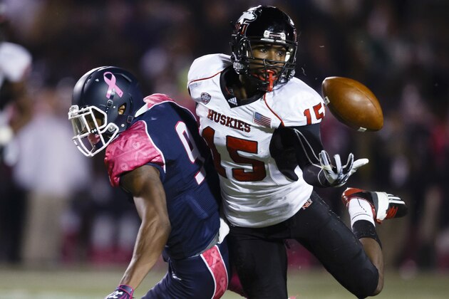 FILE - In this Nov. 20, 2013, file photo, Northern Illinois safety Jimmie Ward (15) intercepts a pass intended for Toledo wide receiver Alonzo Russell (9) during the first quarter of an NCAA college football game in Toledo, Ohio. Ward was selected in the first round, 30th overall, by the San Francisco 49ers in the NFL draft on Thursday, May 8, 2014. (AP Photo/Rick Osentoski, File)