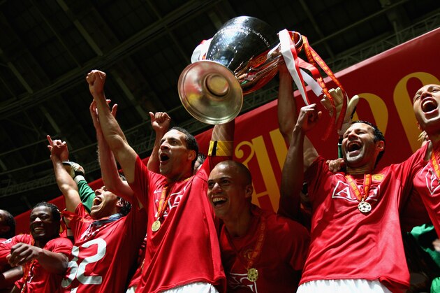 MOSCOW - MAY 21:  Rio Ferdinand and Ryan Giggs of Manchester United lift the trophy following their team's 6-5 victory in the penalty shootout during the UEFA Champions League Final match between Manchester United and Chelsea at the Luzhniki Stadium on May 21, 2008 in Moscow, Russia.  (Photo by Michael Steele/Getty Images)