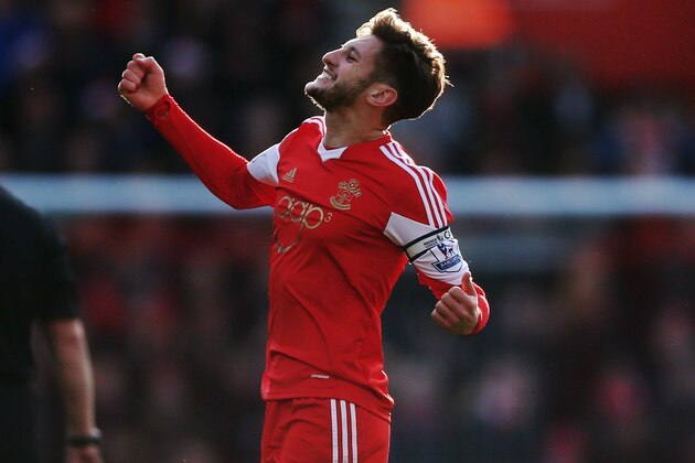 SOUTHAMPTON, ENGLAND - DECEMBER 22:  Adam Lallana of Southampton celebrates after scoring the opening goal during the Barclays Premier League match between Southampton and Tottenham Hotspur at St Mary's Stadium on December 22, 2013 in Southampton, England.  (Photo by Paul Gilham/Getty Images)