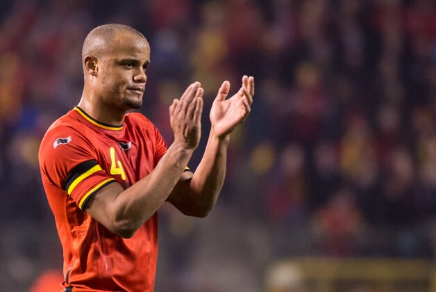 Belgium's Vincent Kompany reacts disappointed after the equaliser by Ivory Coast in extra time during a friendly soccer match at the King Baudouin stadium in Brussels on Wednesday March 5, 2014. (AP Photo/Geert Vanden Wijngaert)
