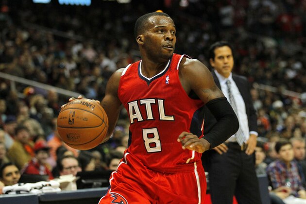 Atlanta Hawks point guard Shelvin Mack (8) drives to the basket in the fourth period in an NBA basketball game against the Miami Heat in Atlanta, Monday, Jan. 20, 2014.  Hawks won the game 121-114 (AP Photo/Todd Kirkland)