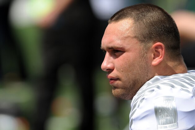 EUGENE, OR - APRIL 27: Colt Lyerla #15 of the Oregon Duckslooks on from the sidelines during the second half of the Oregon Spring Game at Autzen Stadium on April 27, 2013 in Eugene, Oregon. (Photo by Steve Dykes/Getty Images)