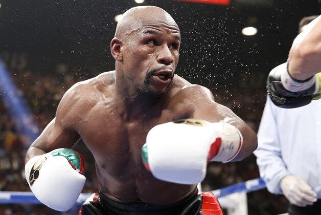 Floyd Mayweather Jr. is seen in his WBC-WBA welterweight title boxing fight against Marcos Maidana Saturday, May 3, 2014, in Las Vegas. (AP Photo/Eric Jamison)