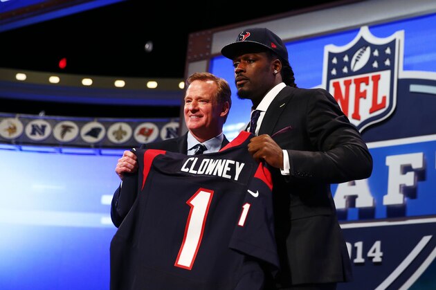 NEW YORK, NY - MAY 08:  Jadeveon Clowney of the South Carolina Gamecocks stands on stage with NFL Commissioner Roger Goodell after he was picked #1 overall by the Houston Texansduring the first round of the 2014 NFL Draft at Radio City Music Hall on May 8, 2014 in New York City.  (Photo by Elsa/Getty Images)