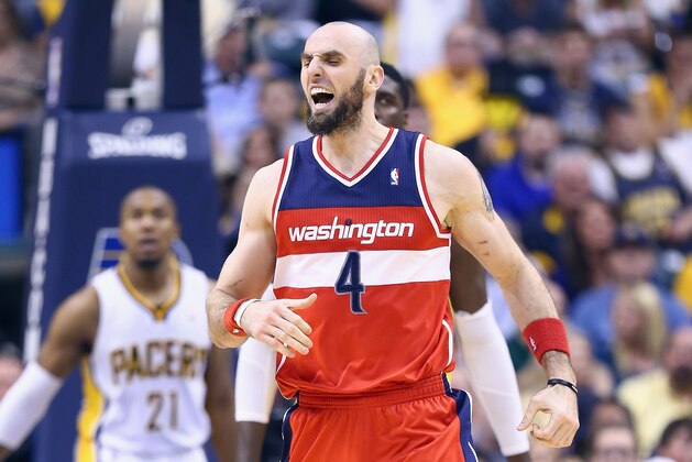 INDIANAPOLIS, IN - MAY 13:  Marcin Gortat #4 of the Washington Wizards celebrates against the   Indiana Pacers in Game 5 of the Eastern Conference Semifinals during the 2014 NBA Playoffs at Bankers Life Fieldhouse on May 13, 2014 in Indianapolis, Indiana. NOTE TO USER: User expressly acknowledges and agrees that, by downloading and or using this photograph, User is consenting to the terms and conditions of the Getty Images License Agreement.  (Photo by Andy Lyons/Getty Images)
