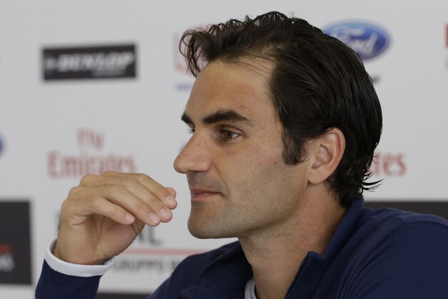 Roger Federer of Switzerland listens to reporters' questions during a press conference at the Italian Open tennis tournament, in Rome, Tuesday, May 13, 2014. (AP Photo/Alessandra Tarantino)
