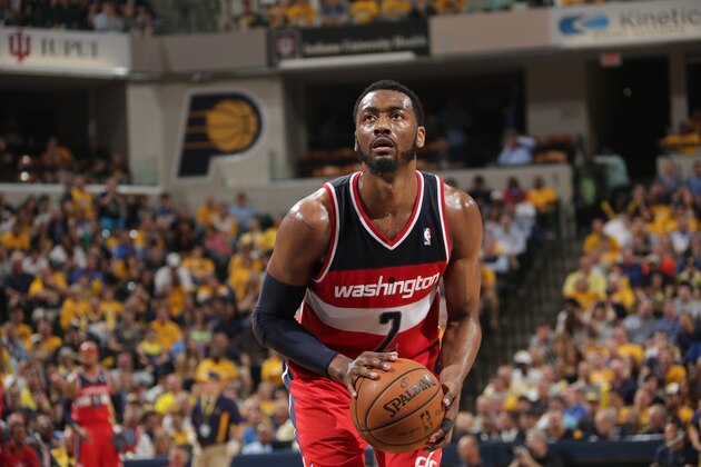 INDIANAPOLIS, IND - MAY 13: John Wall #2 of the Washington Wizards shoots a free throw against the Indiana Pacers in Game Five of the Eastern Conference Semi-Finals during the 2014 NBA Plaoffs at Bankers Life Fieldhouse on May 13, 2014 in Indianapolis, Indiana. NOTE TO USER: User expressly acknowledges and agrees that, by downloading and or using this Photograph, user is consenting to the terms and condition of the Getty Images License Agreement. Mandatory Copyright Notice: 2014 NBAE (Photo by Ron Hoskins/NBAE via Getty Images)