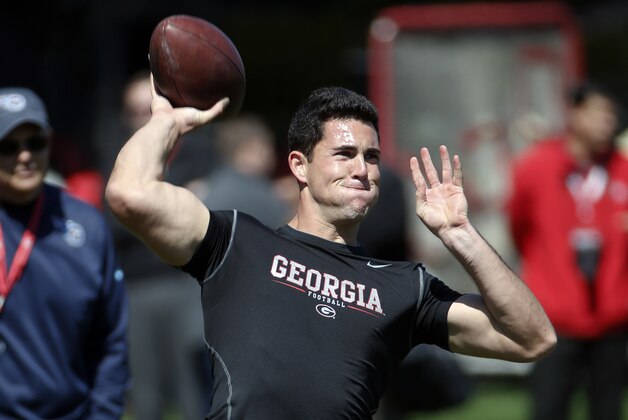 Former Georgia quarterback Aaron Murray works out for NFL football scouts during the school's pro day Wednesday, April 16, 2014 in Athens, Ga.   (AP Photo/John Bazemore)