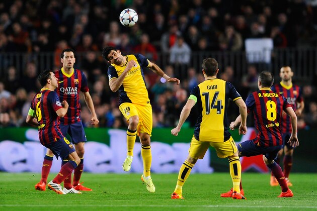 BARCELONA, SPAIN - APRIL 01:  Diego Costa of Club Atletico de Madrid wins a header during the UEFA Champions League Quarter Final first leg match between FC Barcelona and Club Atletico de Madrid at Camp Nou on April 1, 2014 in Barcelona, Spain.  (Photo by David Ramos/Getty Images)