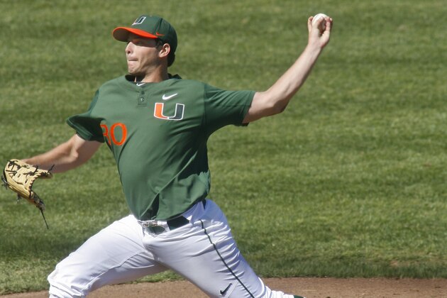 Miami pitcher Andrew Suarez throws in the third inning of an NCAA college baseball game against Florida State, Sunday, March 2, 2014, in Tallahassee, Fla. Florida State won 13-6. (AP Photo/Phil Sears)