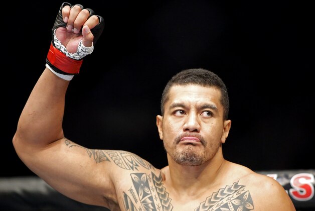 May 10, 2014; Cincinnati, OH, USA; Soa Palelei (red gloves) reacts after knocking out Ruan Potts (not pictured) 2:20 into the first round of a heavyweight bout at US Bank Arena. Mandatory Credit: Joe Maiorana-USA TODAY Sports